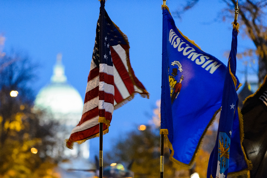 wisconsin capitol with American and Wisconsin flags