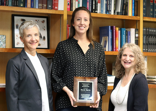 2018 Best Brief Winner, Sarah Wertz (at center), with Professor Trina Tinglum and Dean Raymond